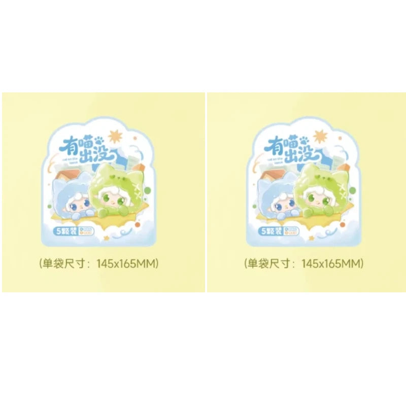 Two illustrations of a cute green cat figurine with blue accents, labeled as blind box collectibles.