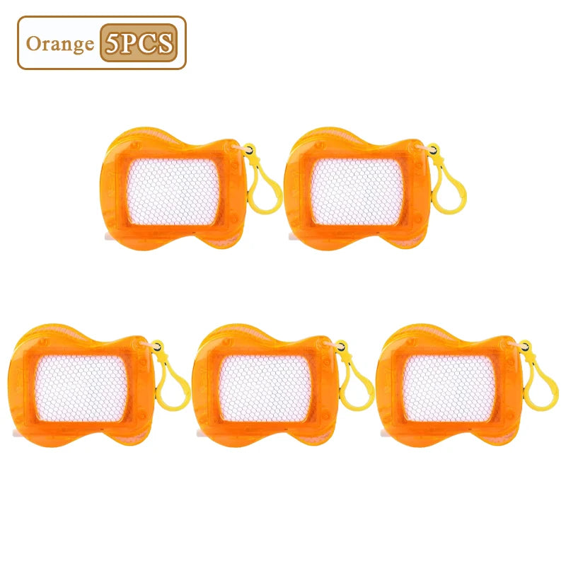 Five orange mini magnetic drawing board keychains with white grid surfaces and yellow loops