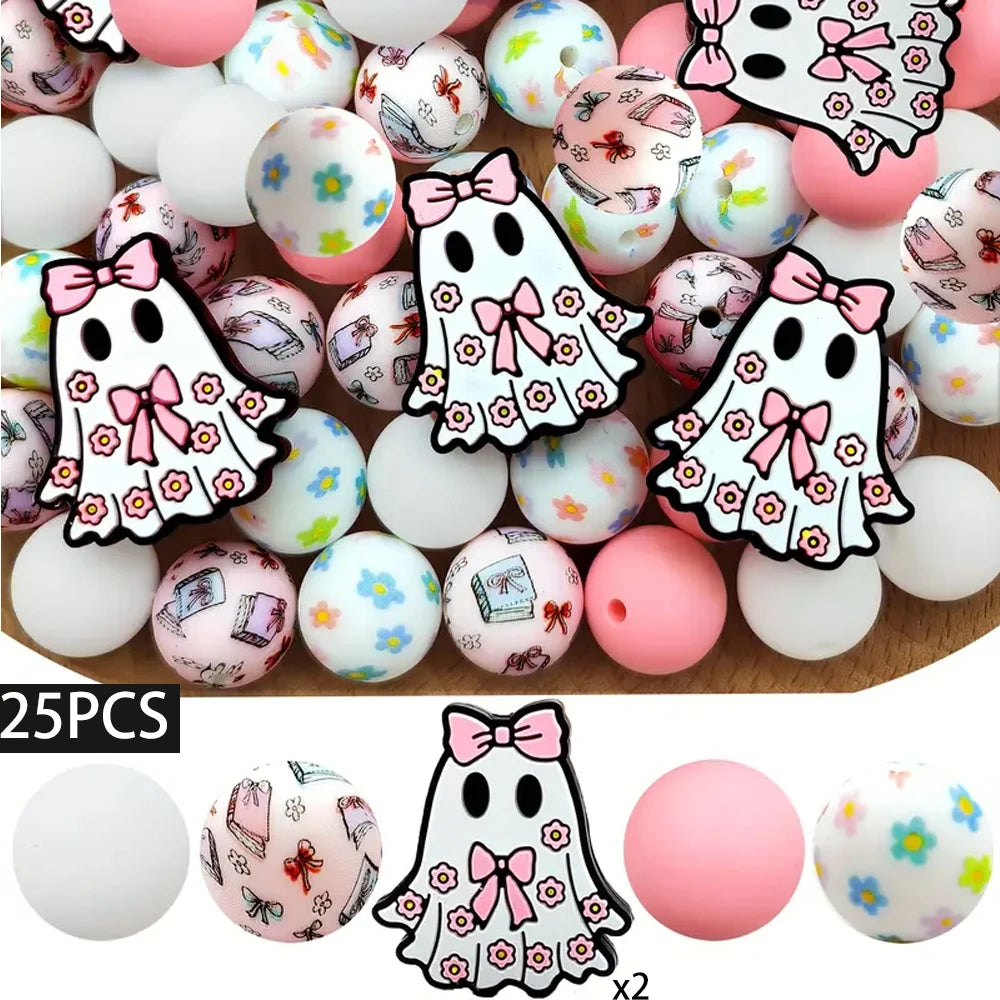 A set of 25 silicone Halloween-themed beads featuring ghost designs in white, pink, and black.