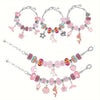 A set of pink charm bracelets and necklaces with various beads and charms for making jewelry