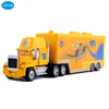 A yellow Disney-themed die-cast toy hauler truck with a large cargo box and wheels.