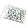 A clear plastic bag filled with white numbered balls for bingo and lottery games