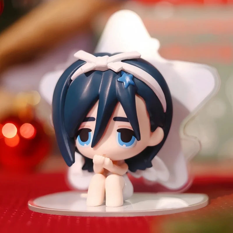 A mini figure collectible of a character with dark blue hair and blue eyes, featuring a white bow accessory.