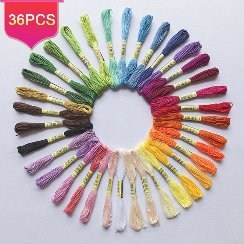 A circular arrangement of 36 strands of vibrant embroidery floss in various colors for cross stitch and crafts