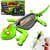 A remote control wall-climbing lizard robot toy with LED eyes and accessories displayed on a white background.