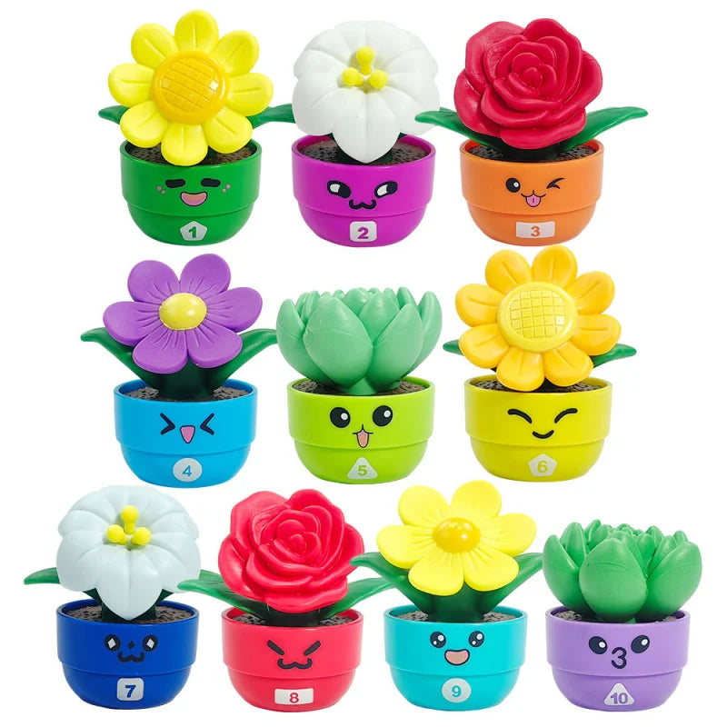A collection of ten colorful, potted flowers in various shades of yellow, pink, and green used as a sorting and stacking toy 