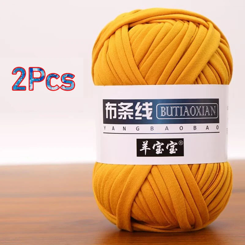 Two balls of yellow soft chunky t-shirt yarn for crochet and knitting