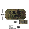 A rectangular olive green reflective patch with the text POUND TOWN and dimensions 4cm by 8cm.