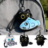 Black plush cat keychain and bag charm with yellow eyes