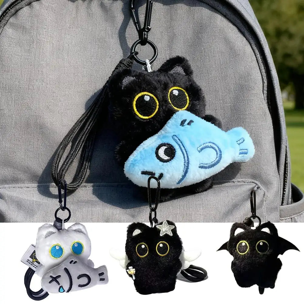 Black plush cat keychain and bag charm with yellow eyes
