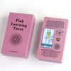A pink box for a Pink Learning Tarot deck featuring the Ace of Cups card design.