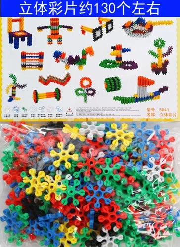 A large collection of colorful snowflake building blocks in various shapes and sizes.