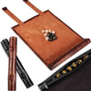 A brown PU leather folding tray with a leather storage bag and dice inside.