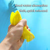 A hand is holding a yellow silicone splash flying ring, demonstrating its water absorption and soft rebound properties.