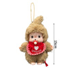 A fluffy brown plush cartoon character with a pom-pom and a red heart charm hanging from a gold chain.