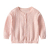 A light pink knitted cotton cardigan for a baby girl with a round neckline and open front