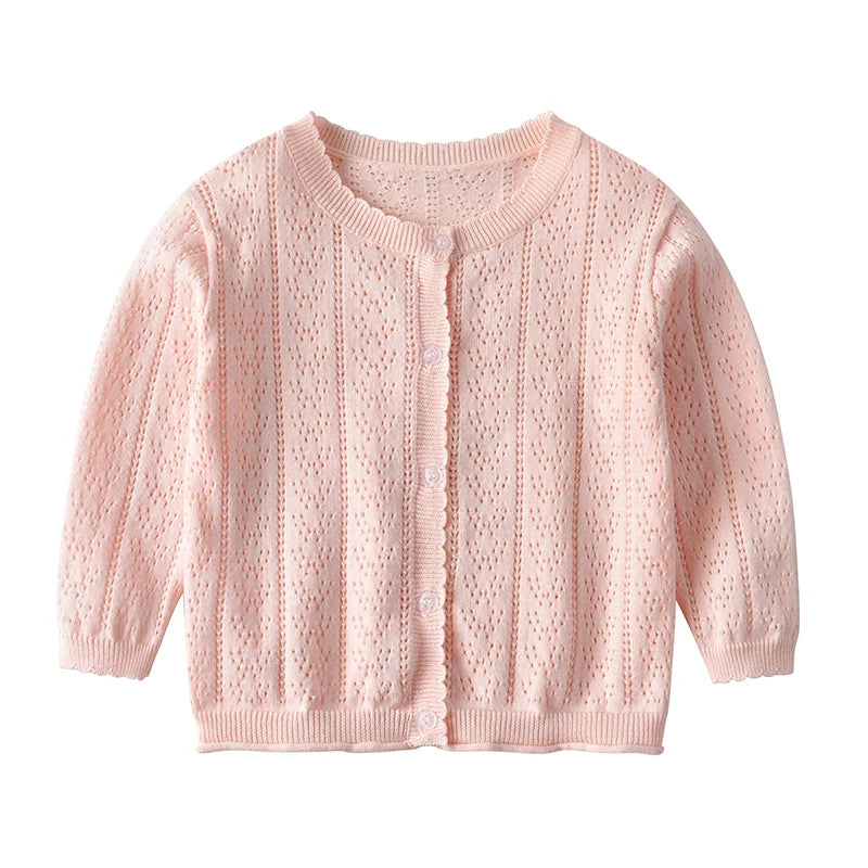 A light pink knitted cotton cardigan for a baby girl with a round neckline and open front