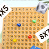 A multiplication learning game featuring a yellow board, dice, and colorful tiles for fun gameplay.