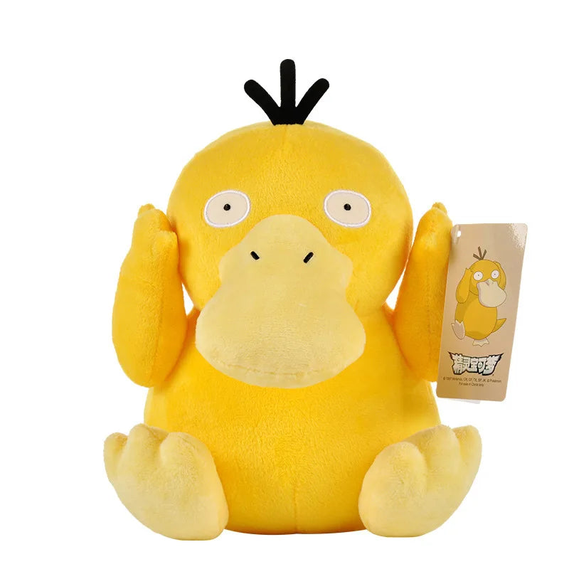 A yellow, fluffy anime plush doll with black horns and large eyes.