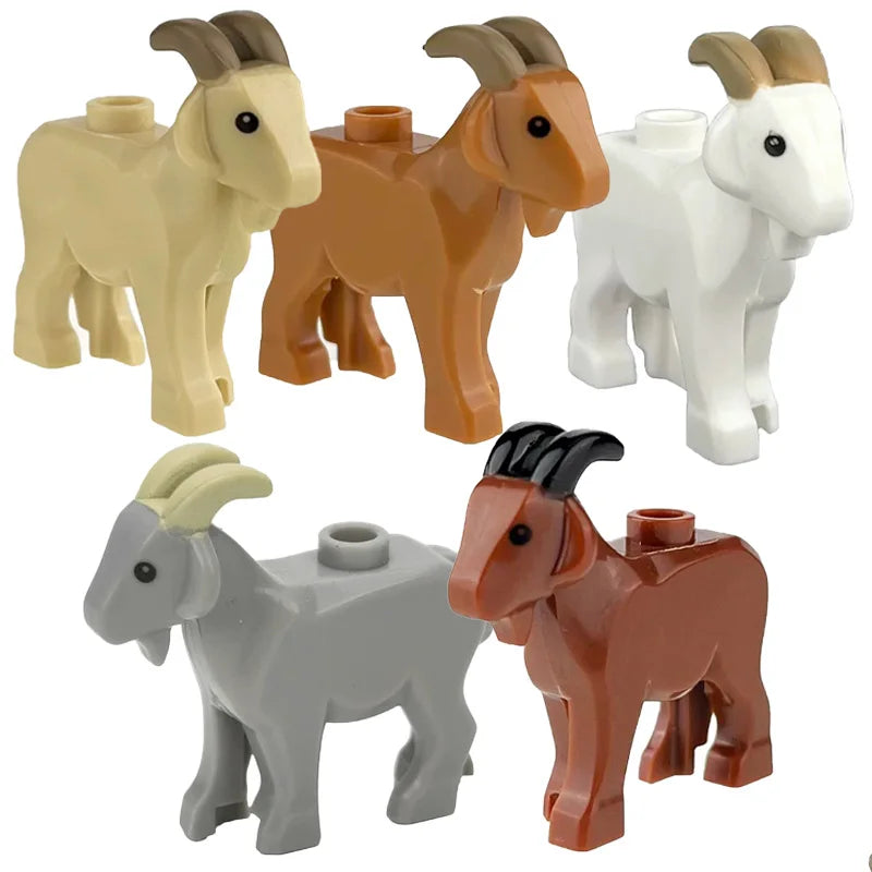 A set of marine animal building blocks featuring a light yellow shark, an orange octopus, and a white whale.