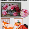 Finished diamond painting display showing a floral landscape and an orange fox artwork.