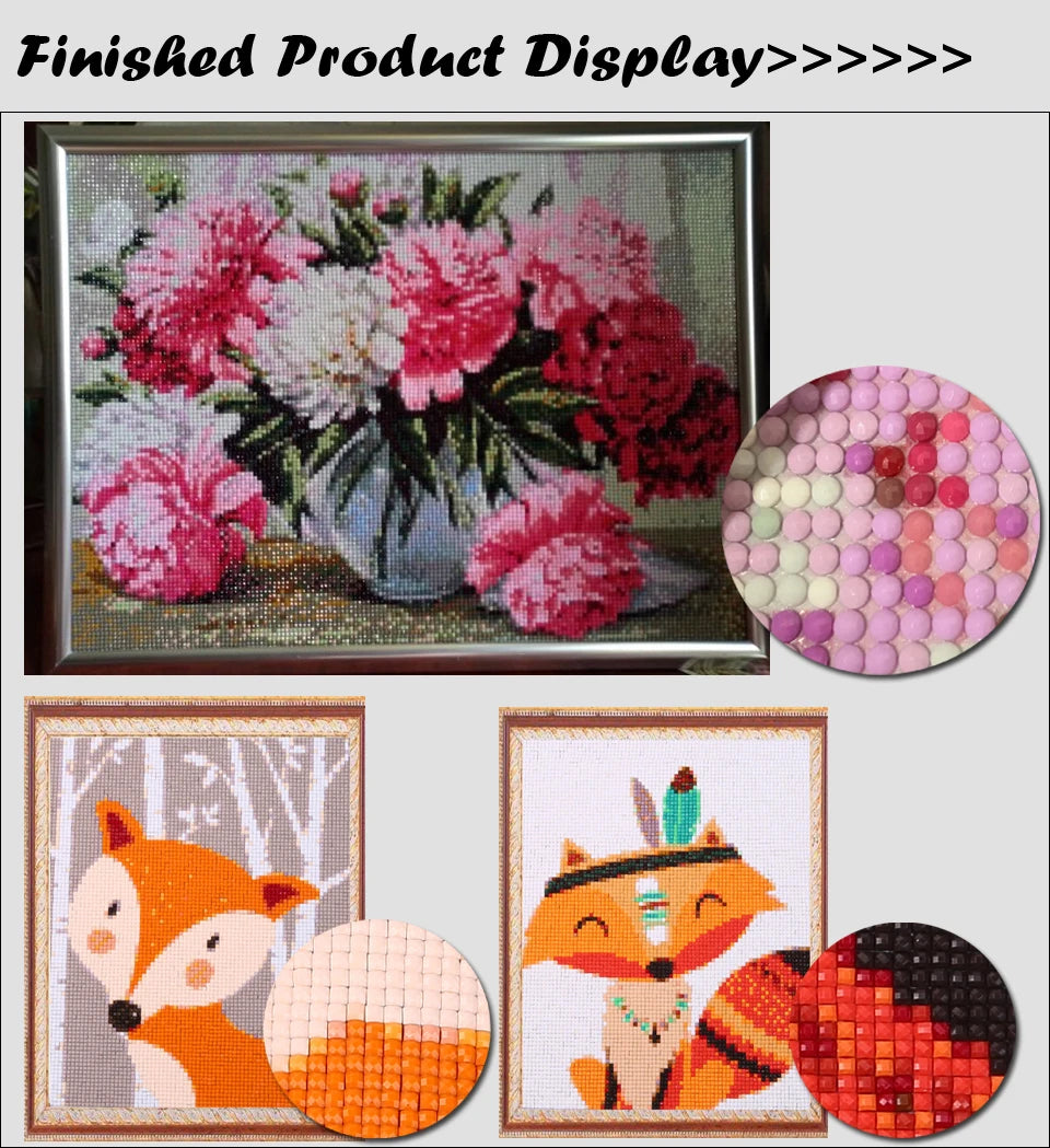 Finished diamond painting display showing a floral landscape and an orange fox artwork.