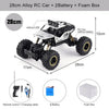 A black 28cm alloy RC car with a battery and foam box shown from above and side views.