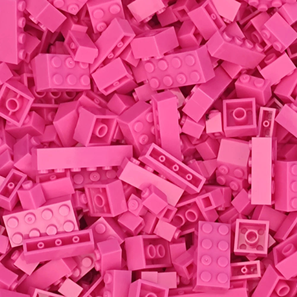 A pile of pink building blocks used for creative DIY projects.