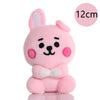 Pink kawaii anime mini plush keychain with white bow and long ears