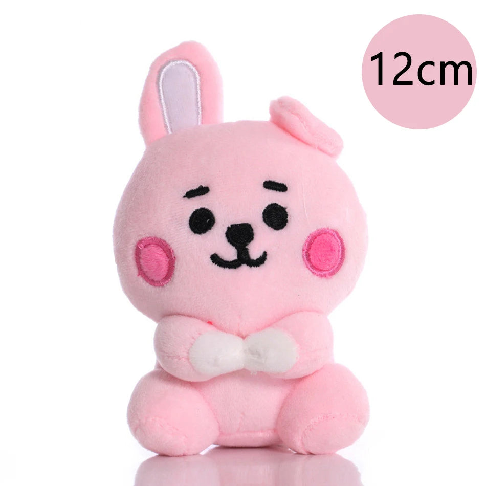 Pink kawaii anime mini plush keychain with white bow and long ears