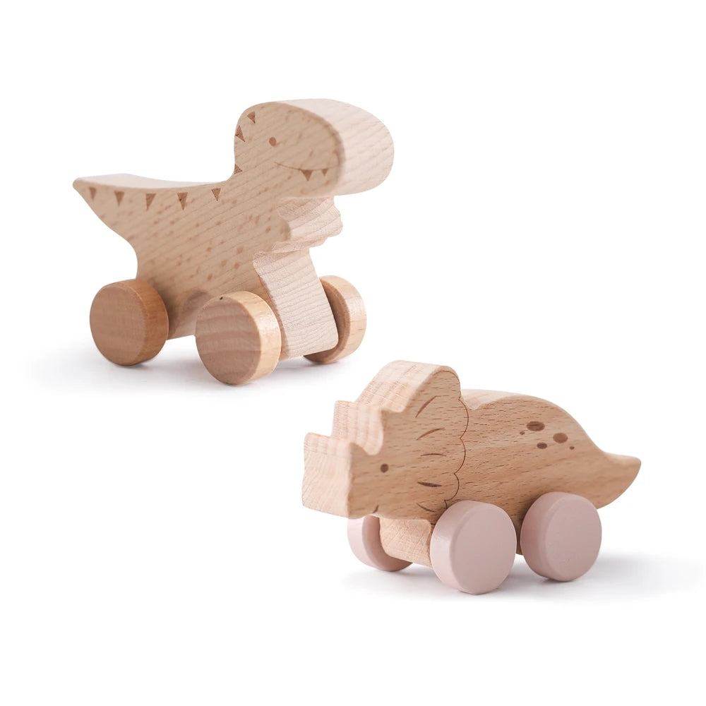A wooden dinosaur teether toy car made of light wood.