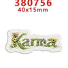 Glitter acrylic flatback resin cabochons in a light green color with floral designs.