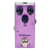 A purple US Dream guitar effects pedal with volume and distance controls.