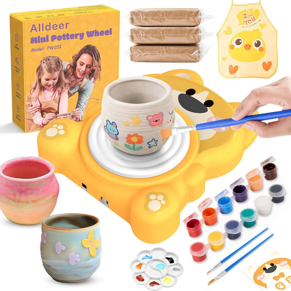 A yellow pottery wheel and a complete craft kit with clay pots, tools, and a yellow apron.