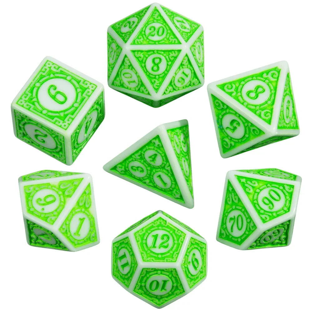 A set of green polyhedral dice including a d6, d8, d10, and d12.