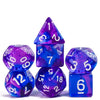 A set of seven translucent polyhedral dice in various shades of blue and purple.