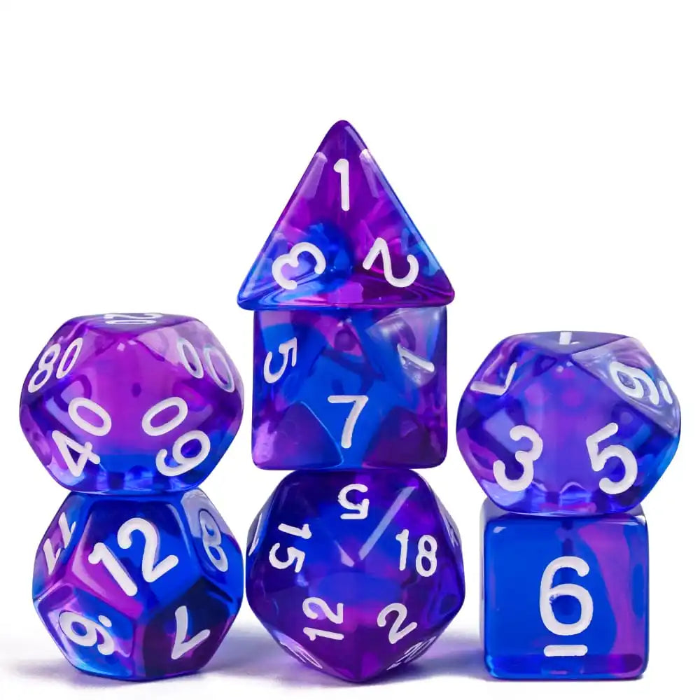 A set of seven translucent polyhedral dice in various shades of blue and purple.