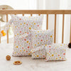 A set of three floral patterned waterproof bags for swimsuits, diapers, and travel items