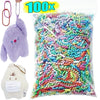 A clear bag filled with colorful ball bead chains for DIY jewelry and keychains, shown next to a fluffy purple plush toy.