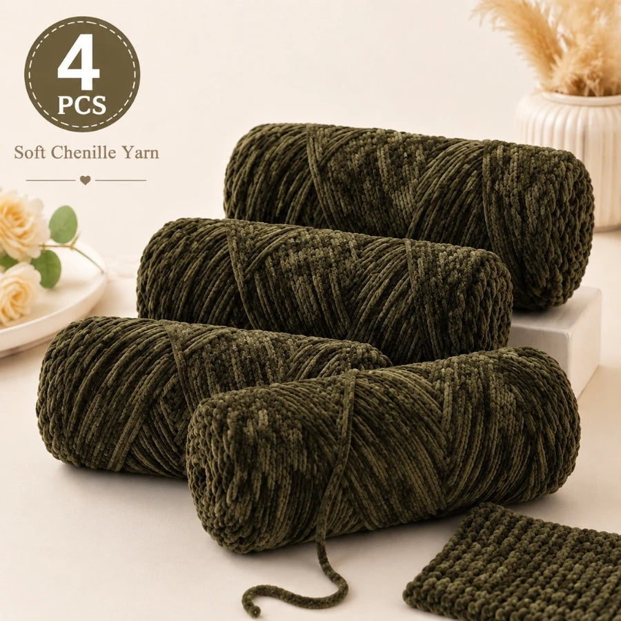 Four skeins of dark olive green soft chenille yarn for crochet and knitting projects.