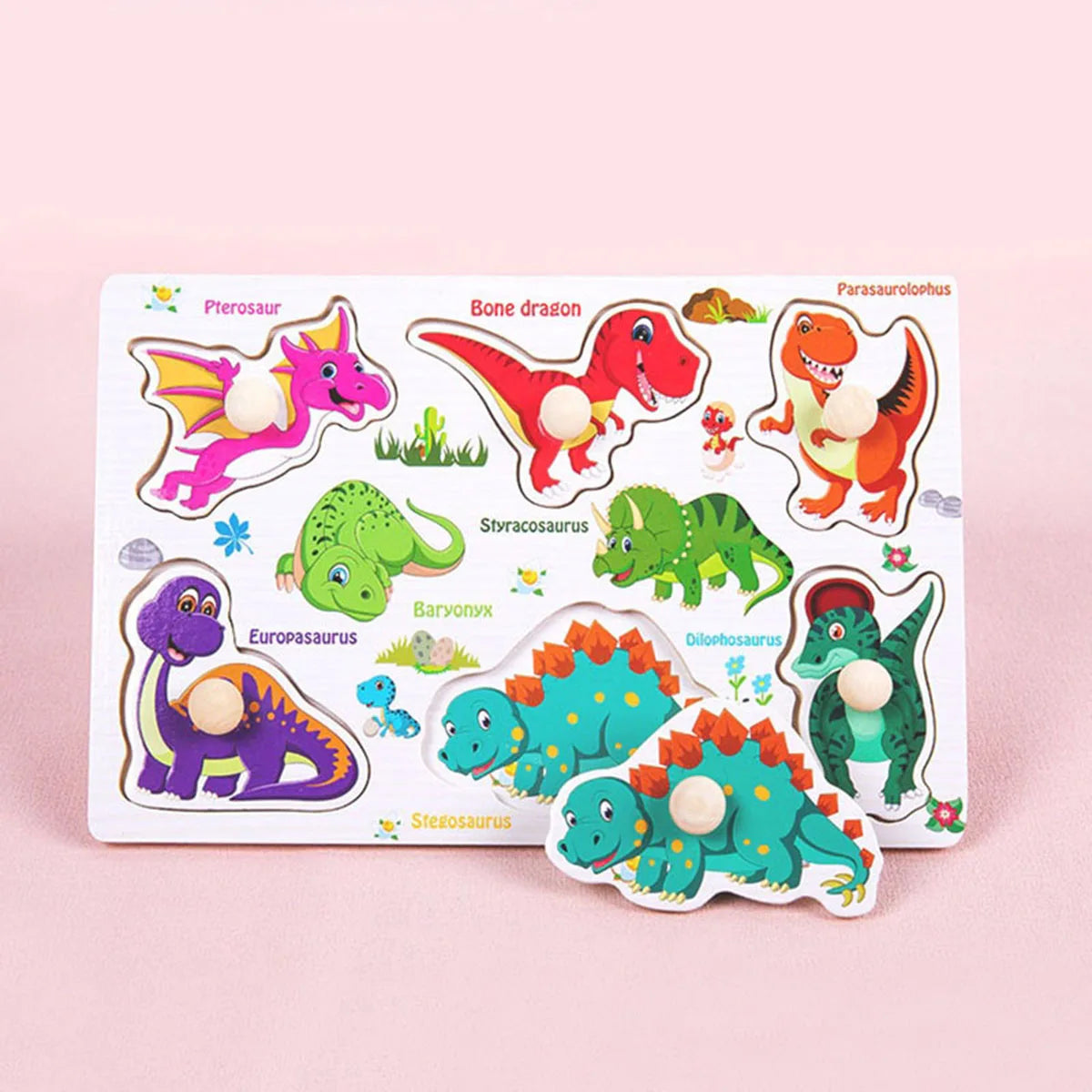 A wooden animal and shape jigsaw puzzle featuring various dinosaurs like Pterosaur, Triceratops, and Brachiosaurus.