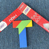 A wooden tangram puzzle featuring geometric shapes in red, green, yellow, and blue.