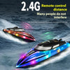 Two remote controlled speedboats with colorful lights are shown moving on the water.