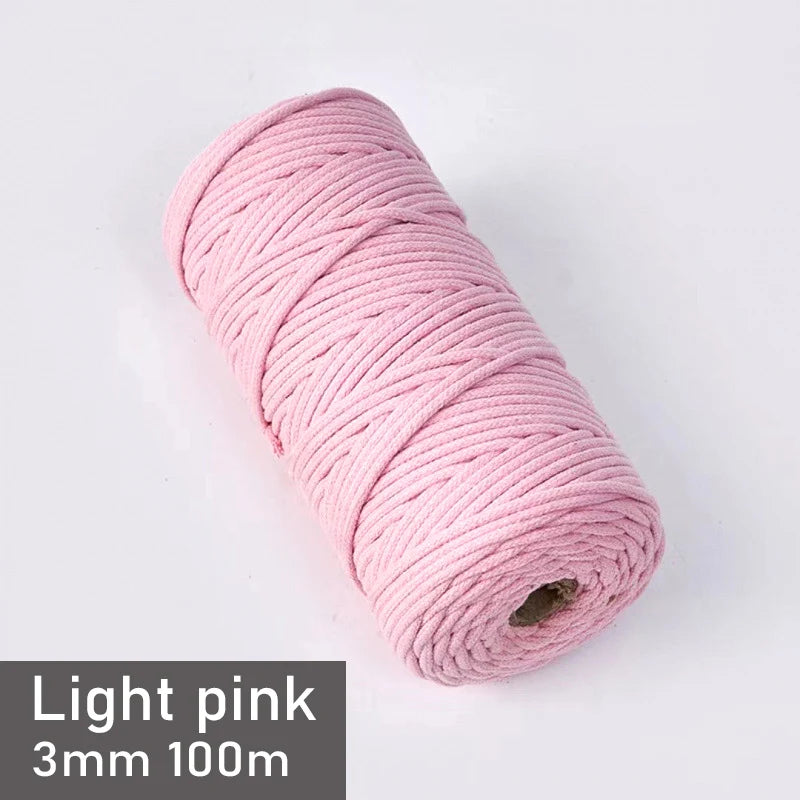 A spool of light pink 3mm cotton macrame cord measuring 100 meters.