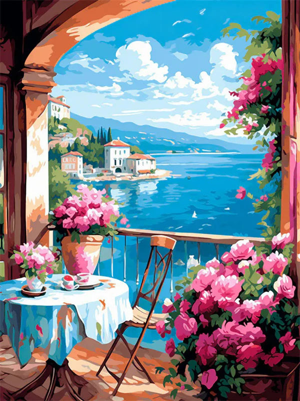 A vibrant painting of a seaside harbor view with lush pink flowers in a window frame.