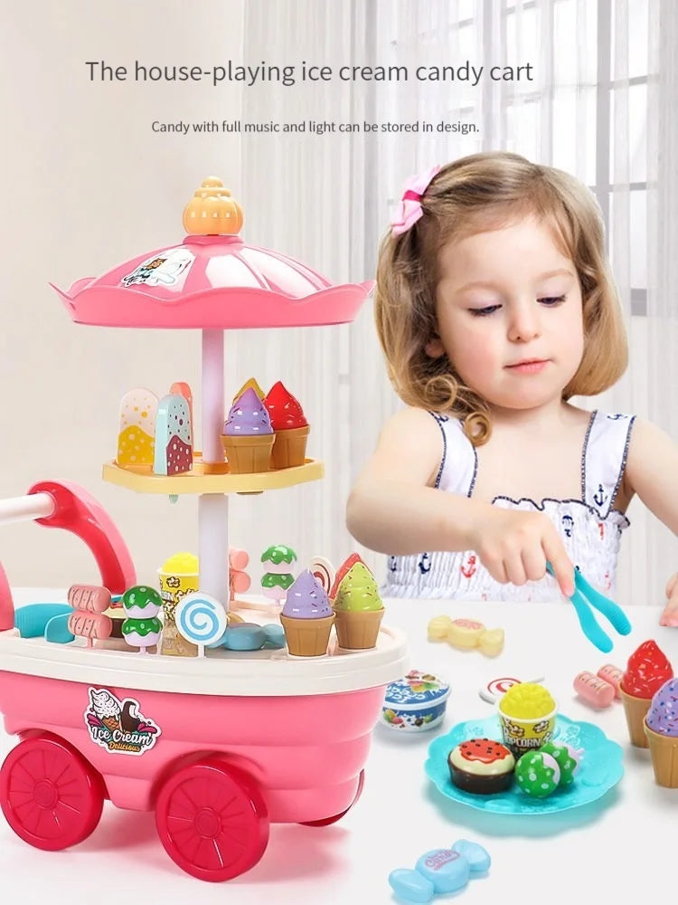 A pink ice cream candy cart toy with various ice cream treats and a young girl playing with it.