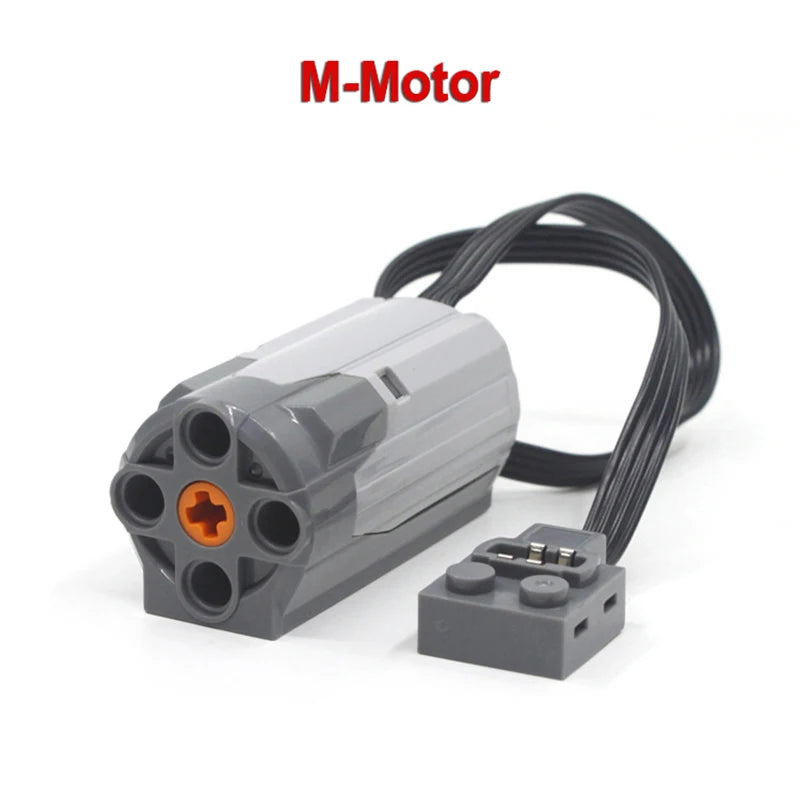 An M-Motor technical power function motor set with a gray housing and black wires.