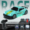 A light blue RC drift car with a rear spoiler is shown alongside its remote control, battery, charging cable, and foam box.