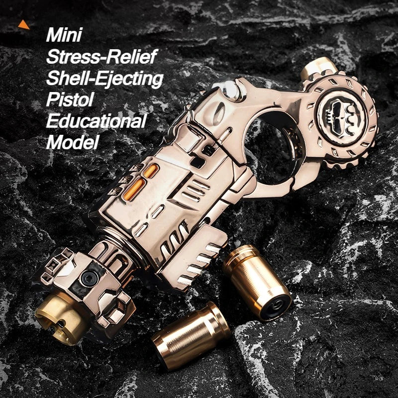 A small, silver alloy stress-relief pistol model with ejecting shell and a separate fidget spinner component on a dark surfac