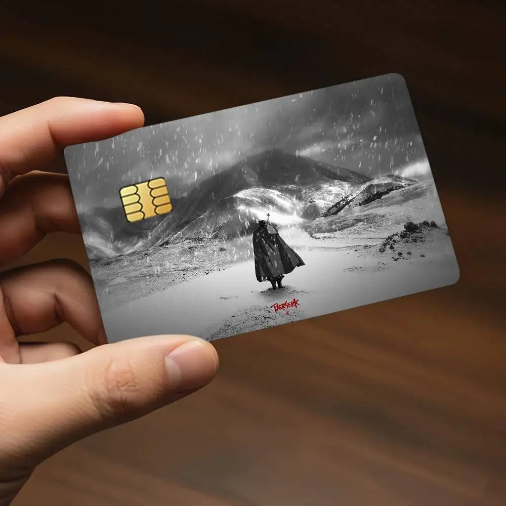A black and white illustration of a dark figure standing in a snowy landscape with falling snow and gold card stickers.